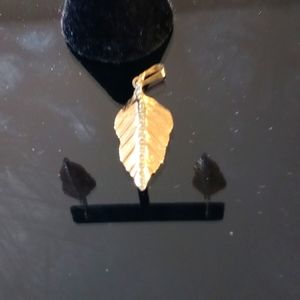 14k gold earrings and 14 gold pendant